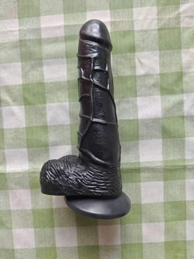 কালো ম্যানুয়াল ডিলডো